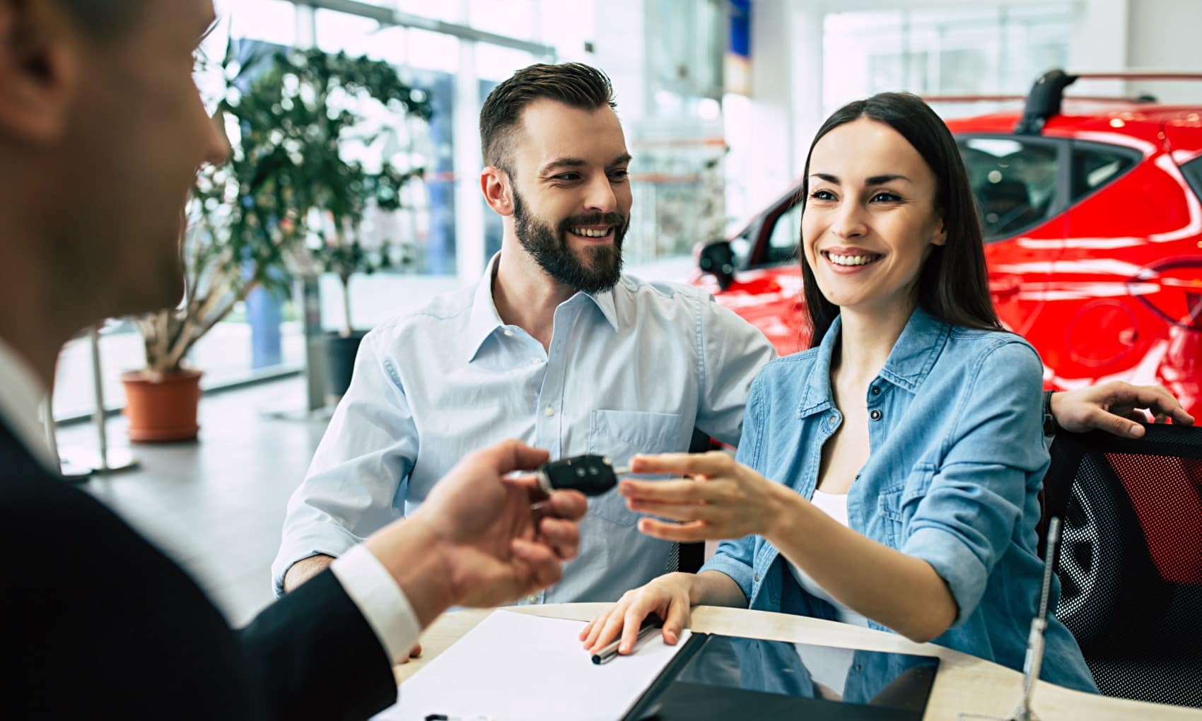 Couple Finishing Financing for a New Toyota
